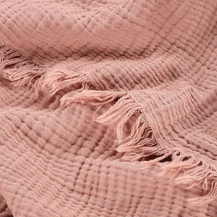 4-layered Muslin Throw Blanket made from 100% natural cotton. Soft, breathable, and lightweight Turkish throw for bedding, sofa, home decor, or gifting.