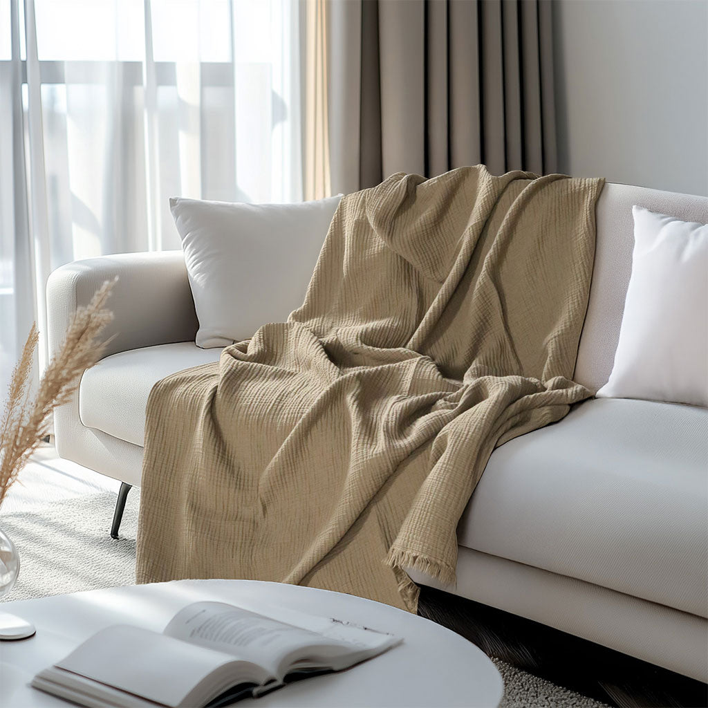 4-layered Muslin Throw Blanket made from 100% natural cotton. Soft, breathable, and lightweight Turkish throw for bedding, sofa, home decor, or gifting.